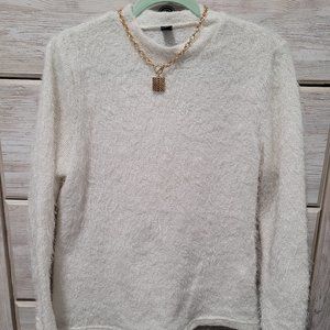 Off-white fuzzy holiday sweater snug fitting